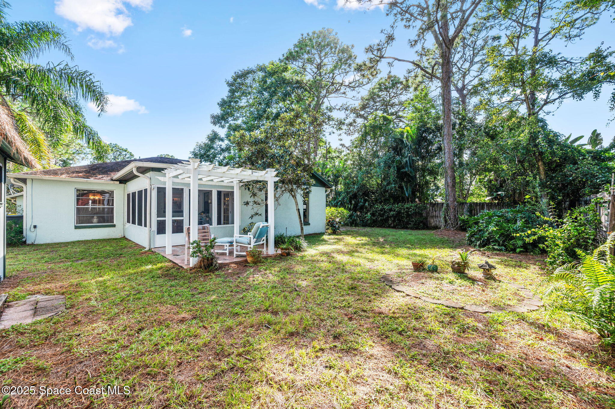 5220 Holden Road Cocoa, FL 32927 - Photo 6 of 31 a view of a house with a yard