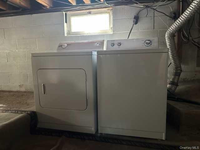 131 Spackenkill Road Poughkeepsie, NY 12603 - Photo 11 of 14 a utility room with dryer and washer