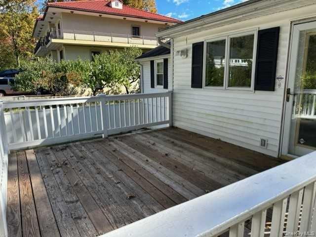 131 Spackenkill Road Poughkeepsie, NY 12603 - Photo 12 of 14 a view of a balcony with wooden floor
