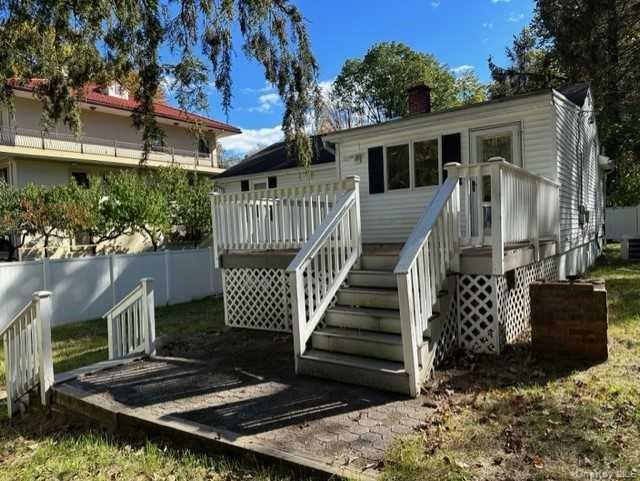 131 Spackenkill Road Poughkeepsie, NY 12603 - Photo 13 of 14 a view of house with a porch and furniture