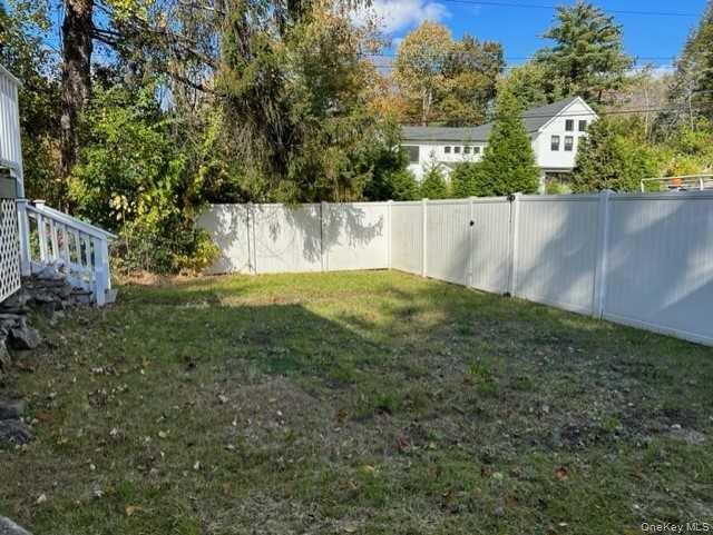 131 Spackenkill Road Poughkeepsie, NY 12603 - Photo 14 of 14 a view of an outdoor space and a yard