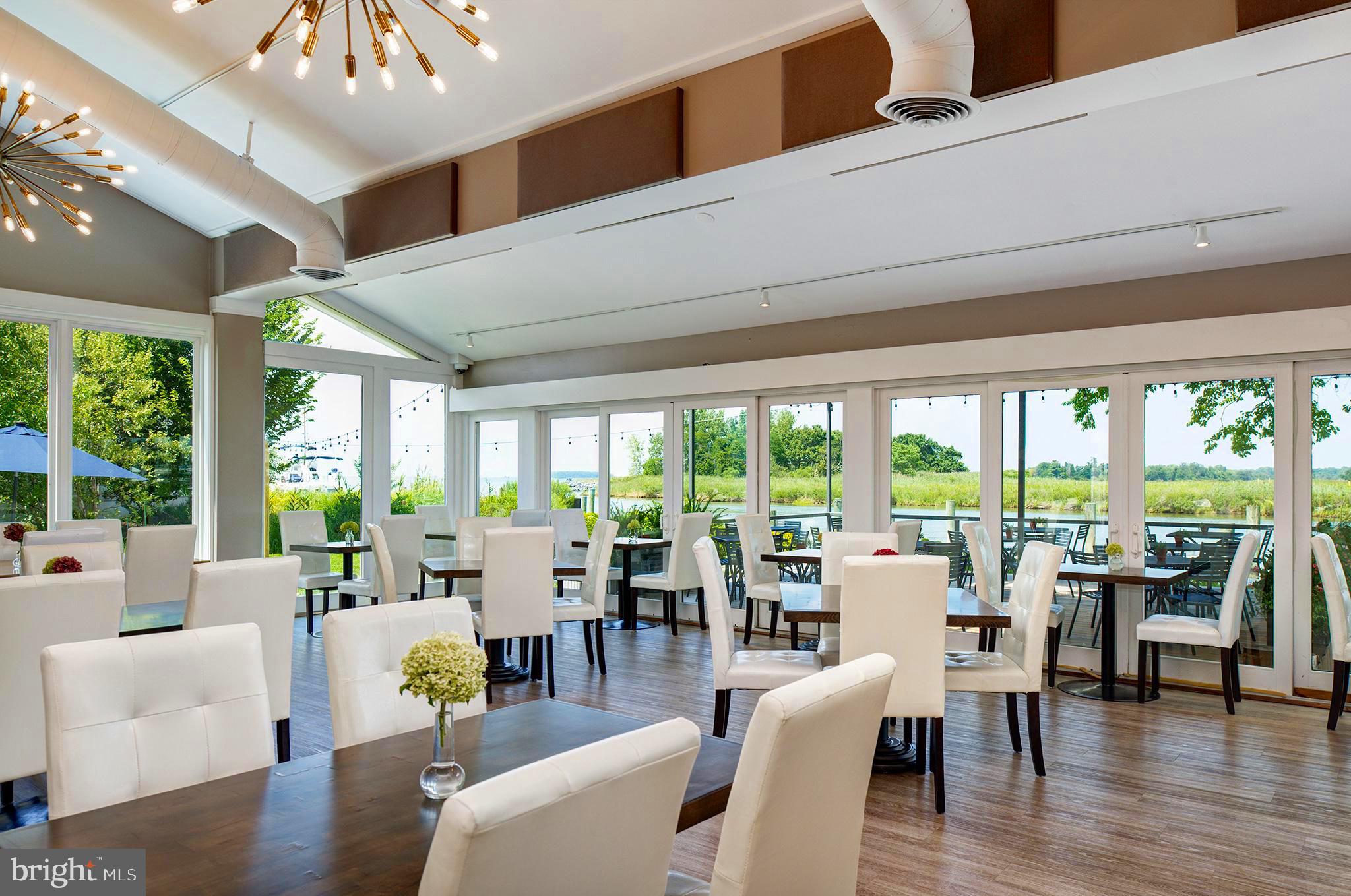 21384 Coopertown Road Tilghman, MD 21671 - Photo 12 of 25 Waterfront restaurant named "Blue"