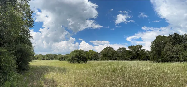 a view of a lake and mountain in the back