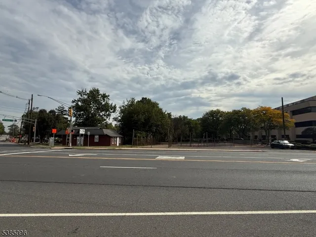 a sign board on the side of a road