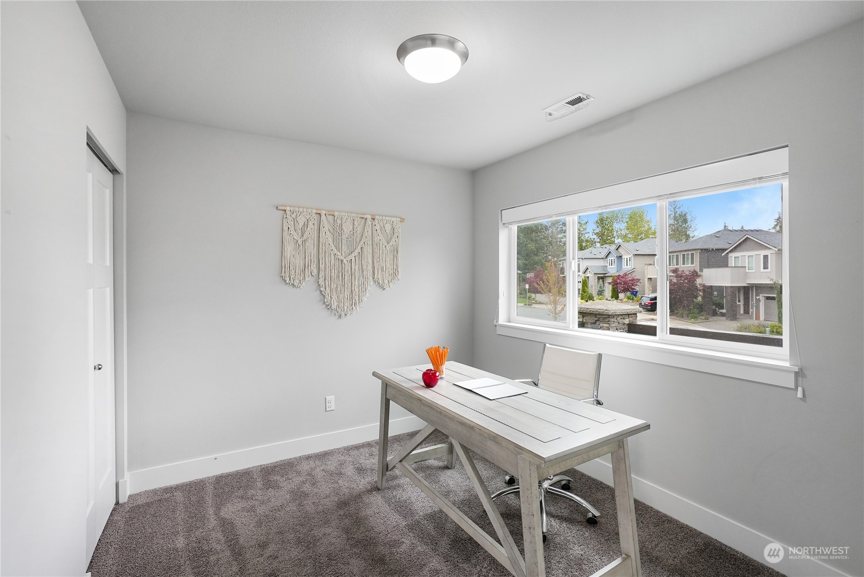 1218 198th Place Southeast Bothell, WA 98012 - Photo 26 of 38 a room with furniture and a window