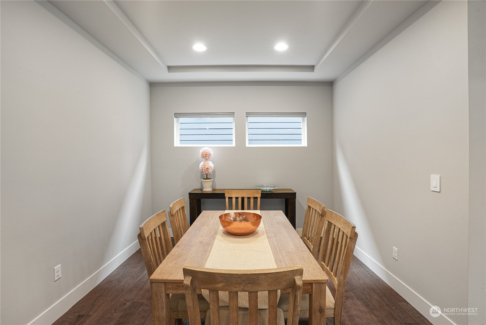 1218 198th Place Southeast Bothell, WA 98012 - Photo 6 of 38 a view of a dining room with a table and chairs