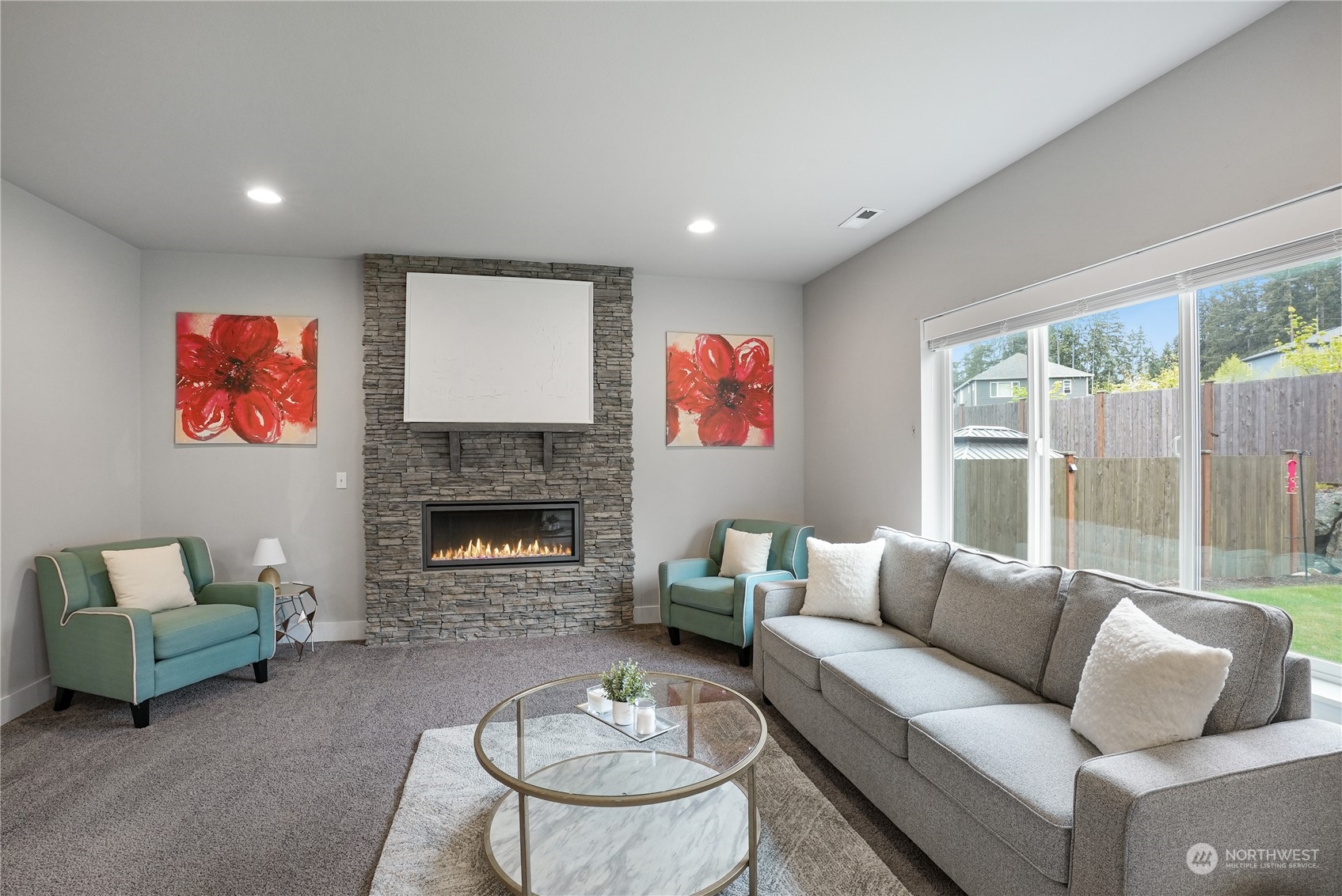 1218 198th Place Southeast Bothell, WA 98012 - Photo 8 of 38 a living room with furniture and a fireplace