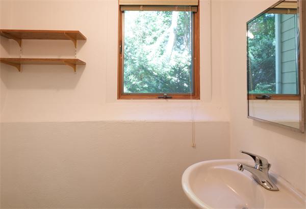 10 Highgate Road Wayland, MA 01778 - Photo 18 of 29 a bathroom with a sink and a window