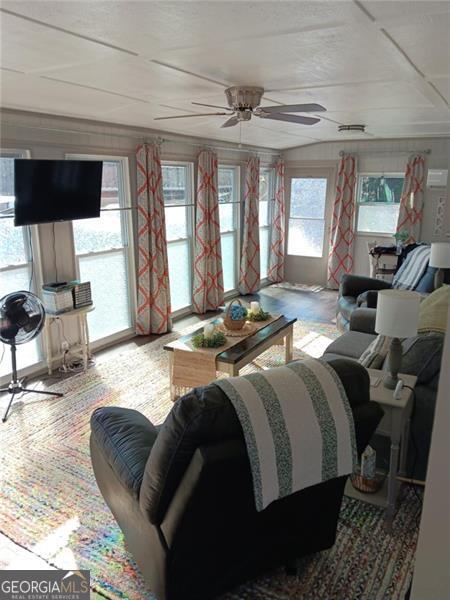 4 Fleetwood Road, Unit 502 Cleveland, GA 30528 - Photo 15 of 45 a large bedroom with a bed and wooden floor