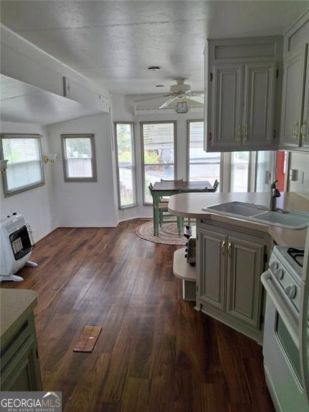 4 Fleetwood Road, Unit 502 Cleveland, GA 30528 - Photo 18 of 45 a kitchen with a sink cabinets and wooden floor