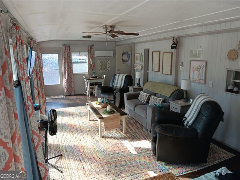 4 Fleetwood Road, Unit 502 Cleveland, GA 30528 - Photo 10 of 45 a living room with fireplace furniture and a rug
