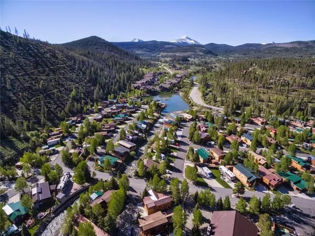an aerial view of residential house and green space