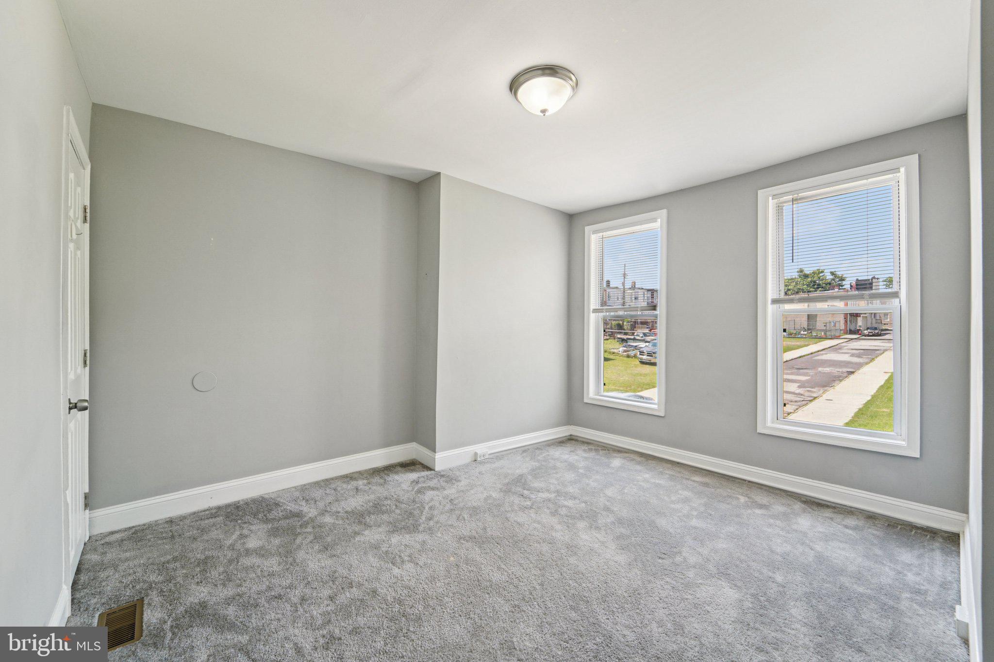 1820 East Lafayette Avenue Baltimore, MD 21213 - Photo 13 of 17 a view of an empty room with a window