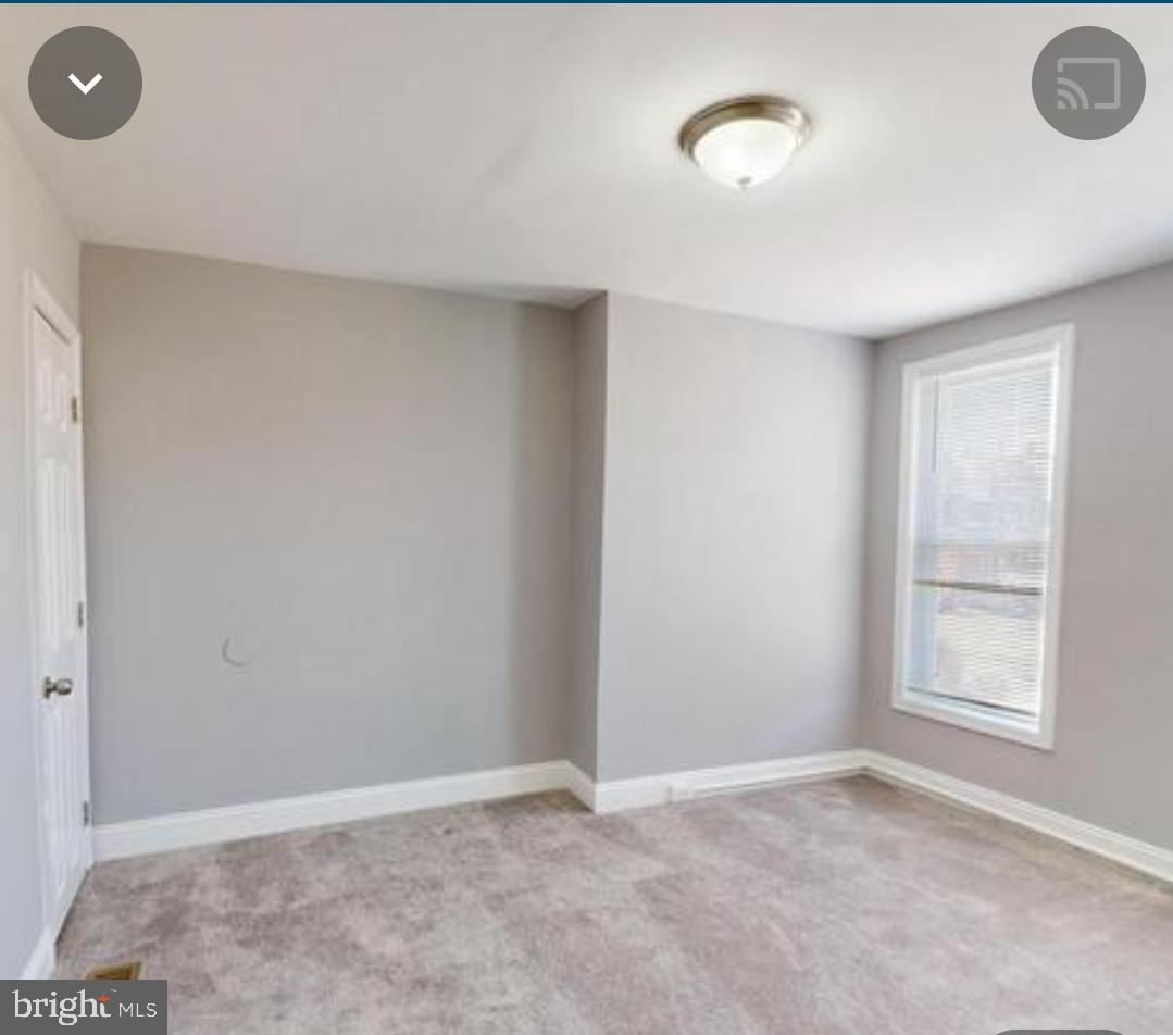 1820 East Lafayette Avenue Baltimore, MD 21213 - Photo 14 of 17 an empty room with windows & closet