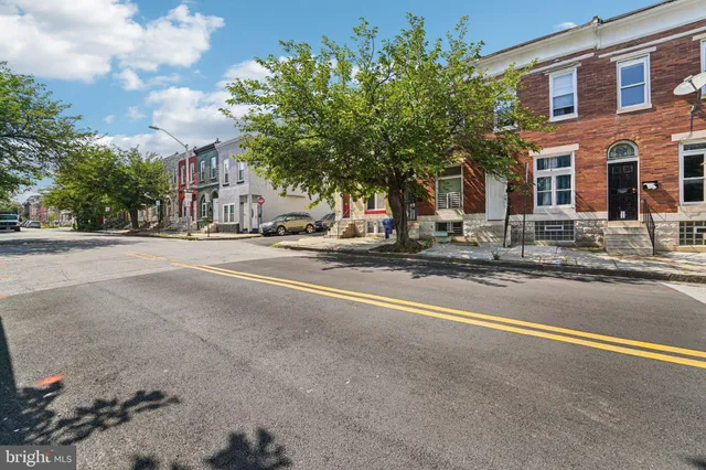 a view of street with large buildings