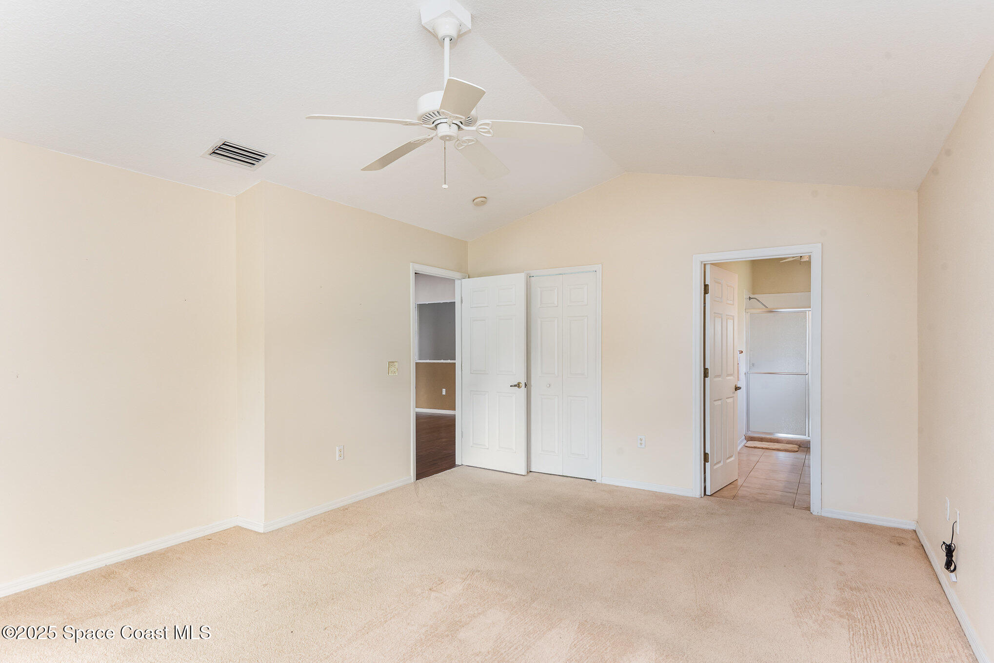2597 Addington Circle Rockledge, FL 32955 - Photo 15 of 28 a view of empty room with a fan