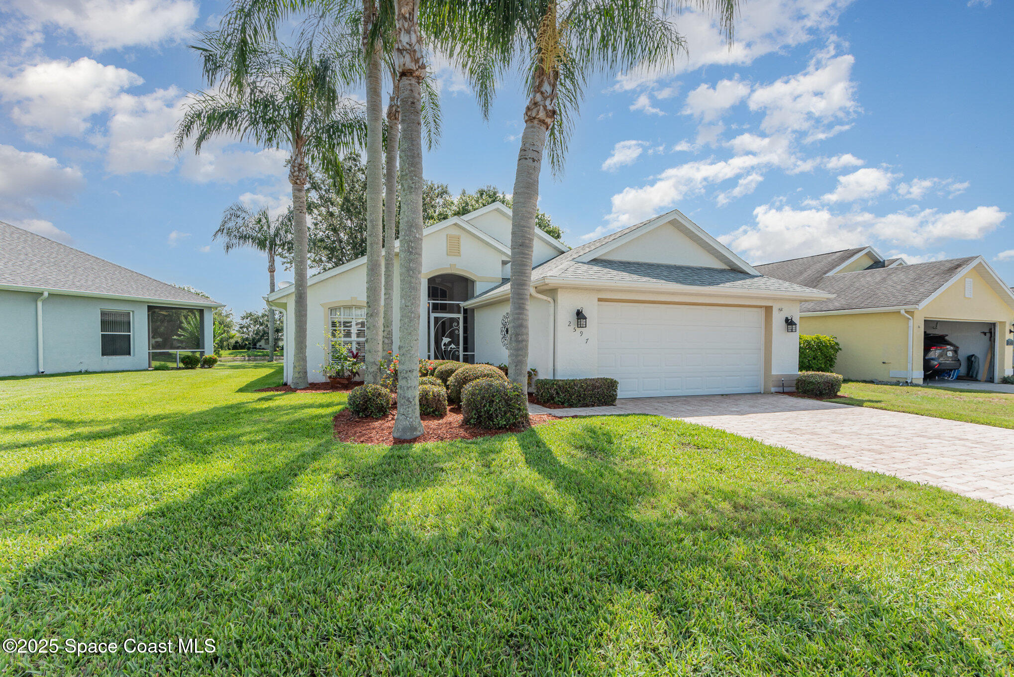 2597 Addington Circle Rockledge, FL 32955 - Photo 4 of 28 a house view with a garden space