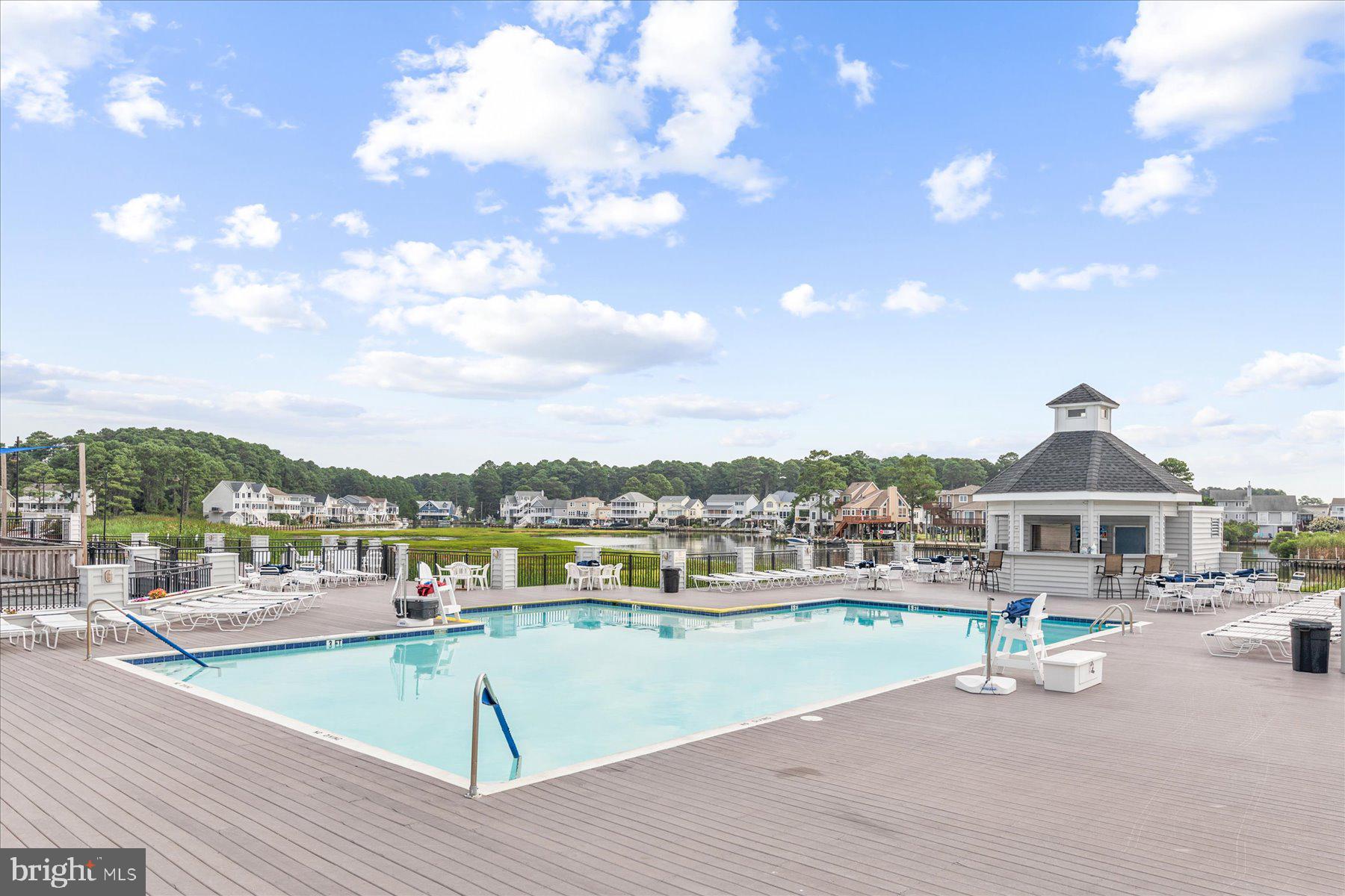 3336 Blackbeard Road Greenbackville, VA 23356 - Photo 27 of 51 a view of a swimming pool and a terrace