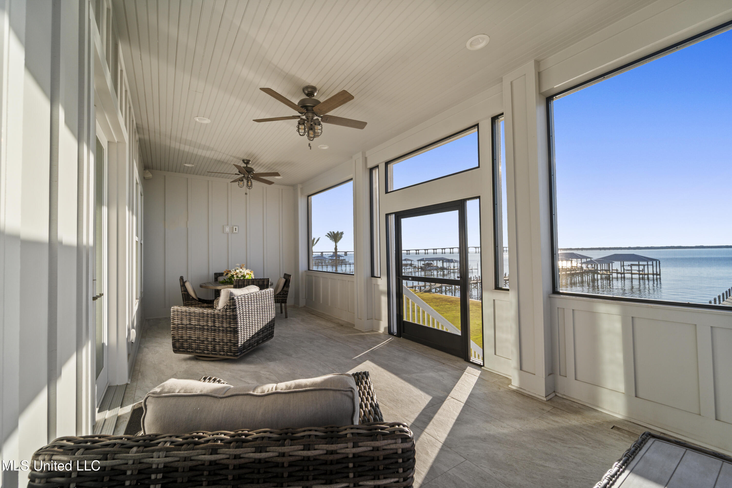 527 Sandy Hook Drive Pass Christian, MS 39571 - Photo 3 of 35 First Floor Screened Porch
