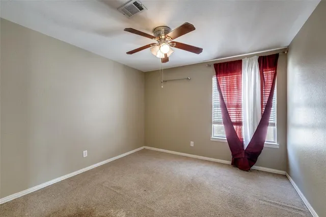 an empty room with window