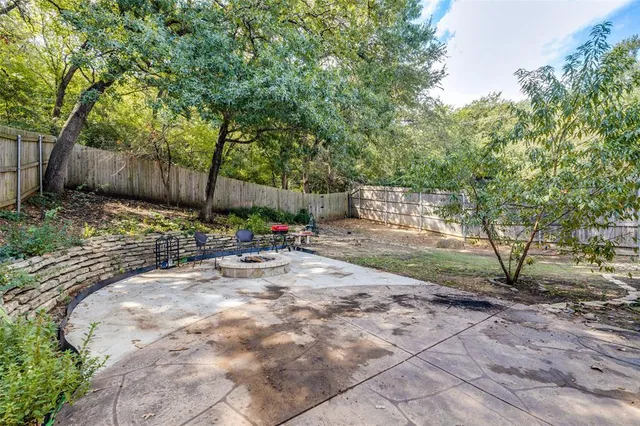 a backyard of a house with lots of green space