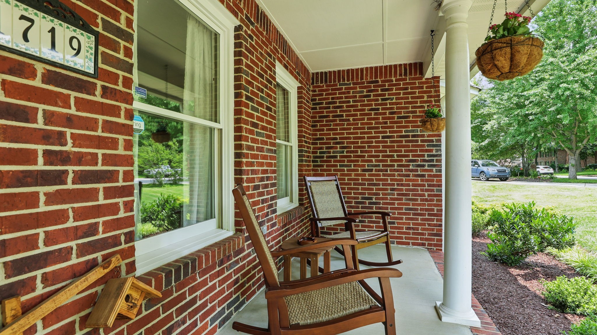 1719 Waterford Road Murfreesboro, TN 37129 - Photo 15 of 55 a view of a door with a bench and a potted plant