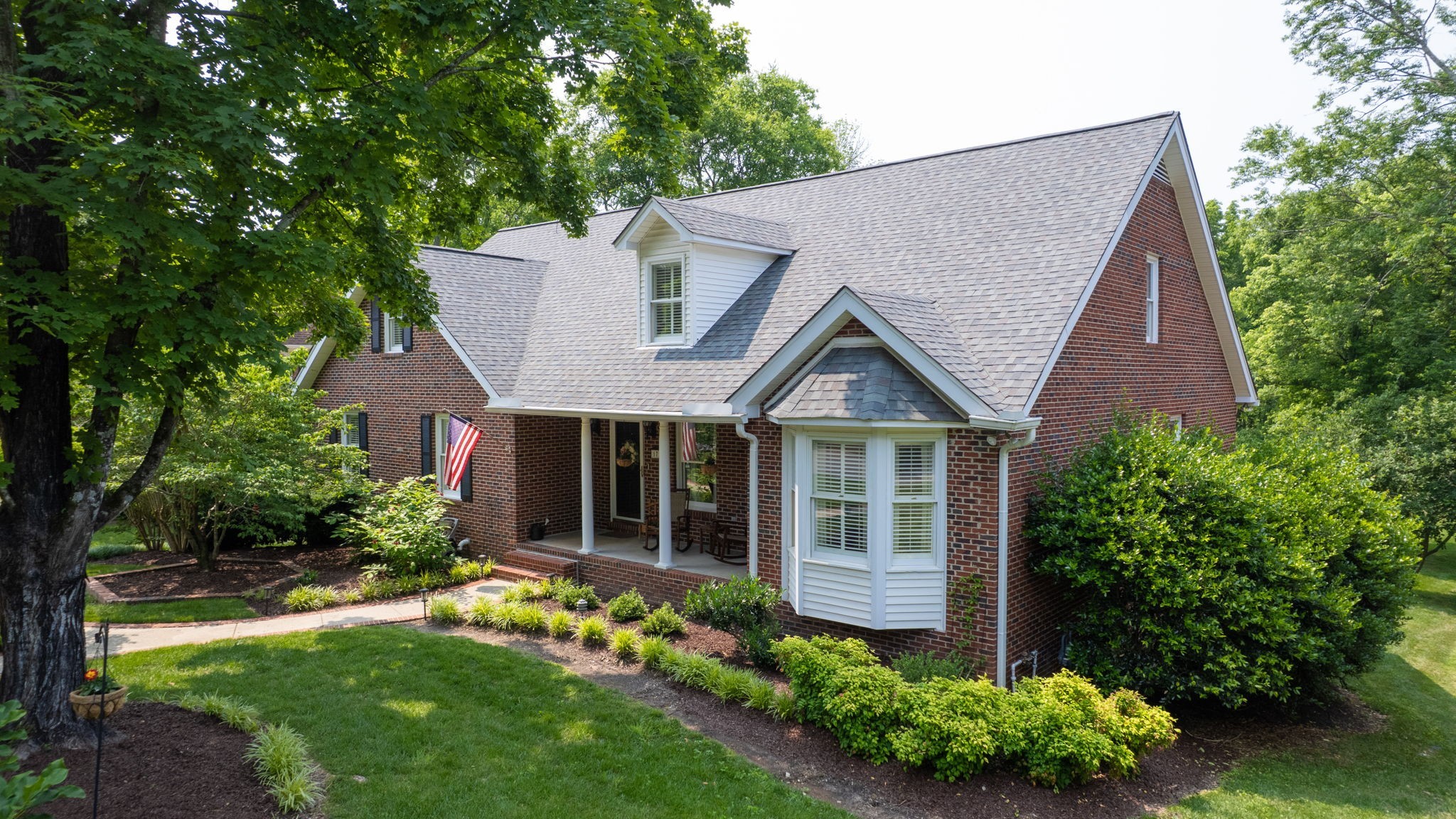 1719 Waterford Road Murfreesboro, TN 37129 - Photo 2 of 55 a front view of a house with a garden