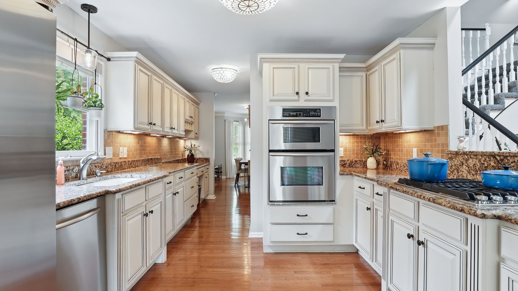 1719 Waterford Road Murfreesboro, TN 37129 - Photo 24 of 55 a kitchen with granite countertop a sink and cabinets