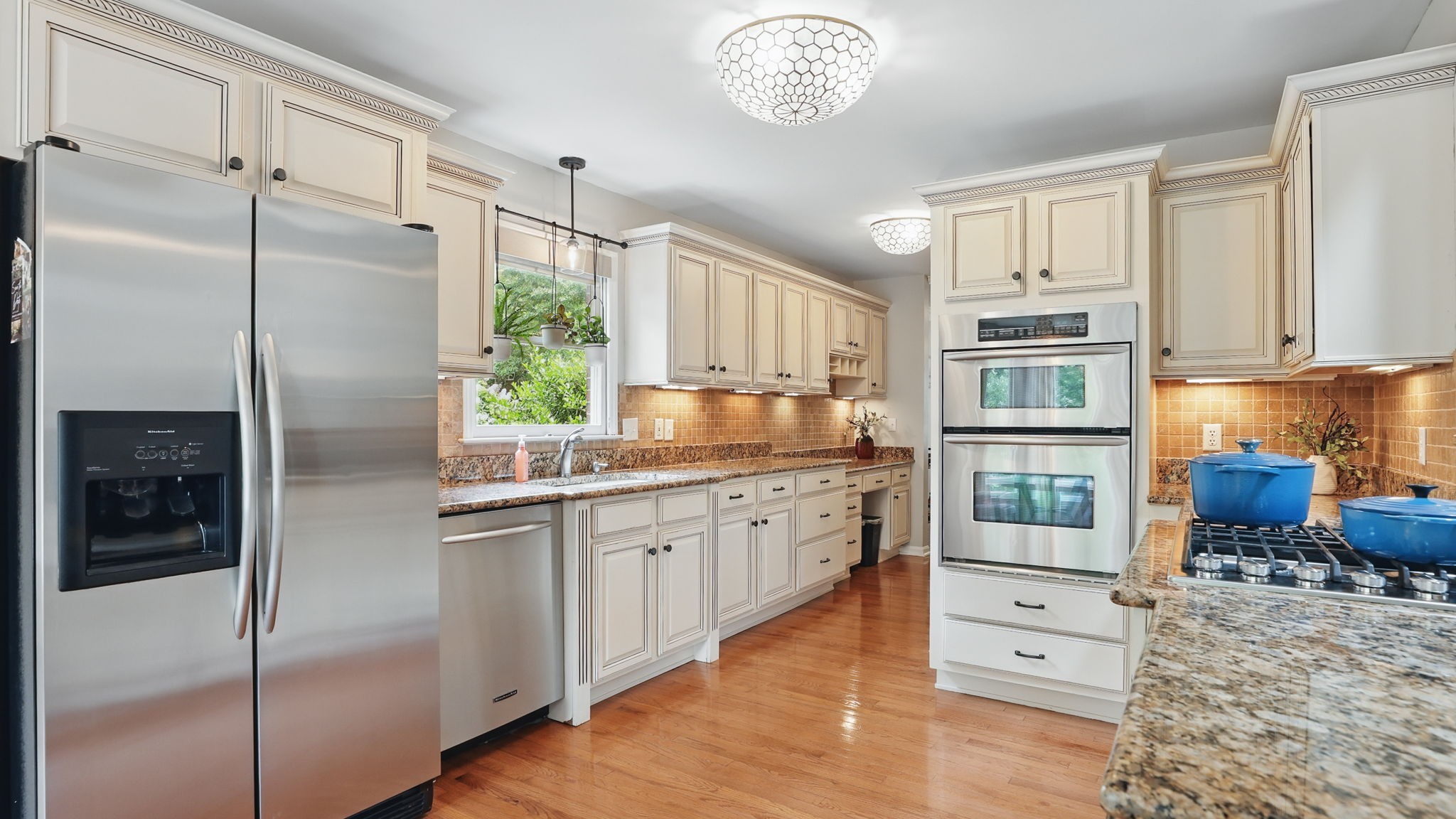 1719 Waterford Road Murfreesboro, TN 37129 - Photo 25 of 55 a kitchen with stainless steel appliances granite countertop a refrigerator sink and cabinets