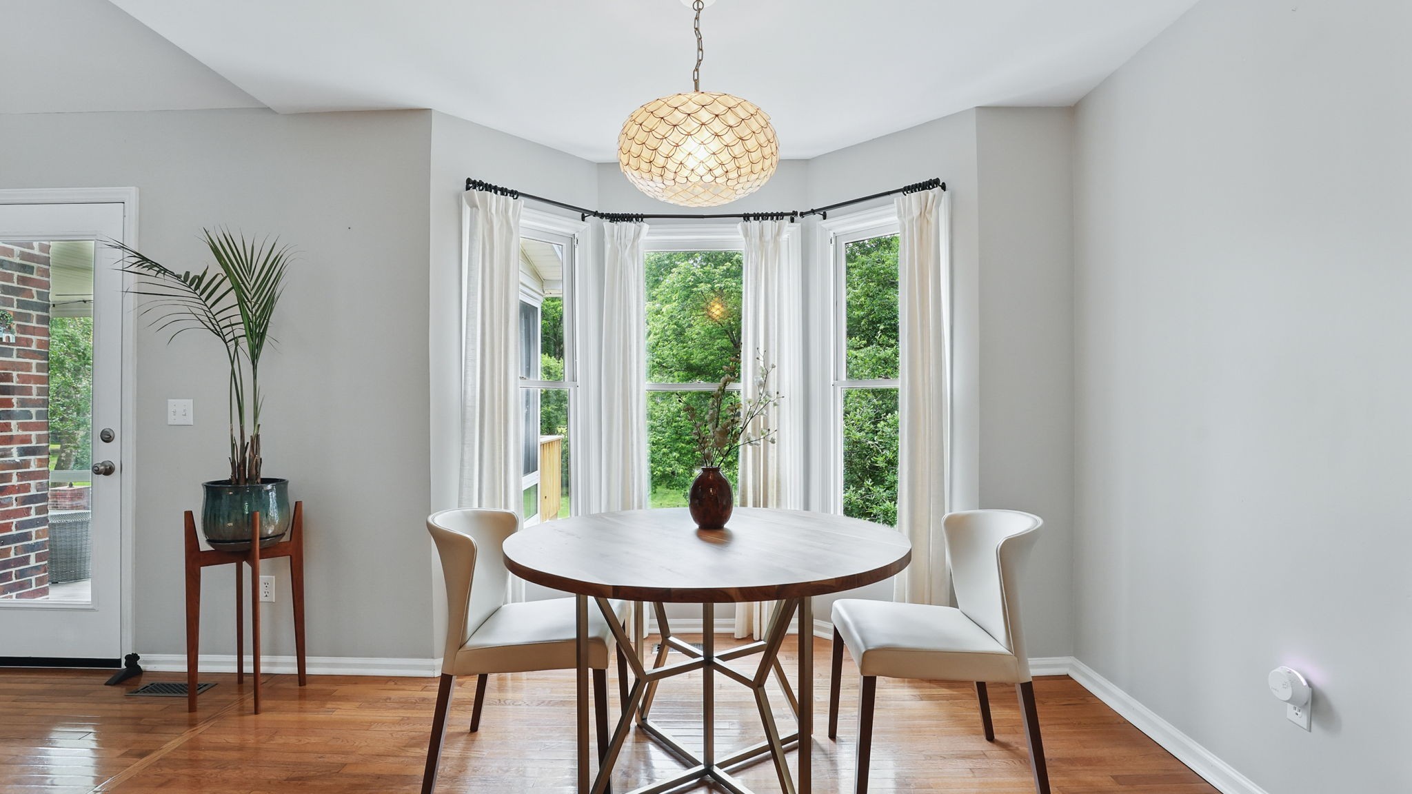 1719 Waterford Road Murfreesboro, TN 37129 - Photo 28 of 55 a view of a dining room with furniture window and wooden floor