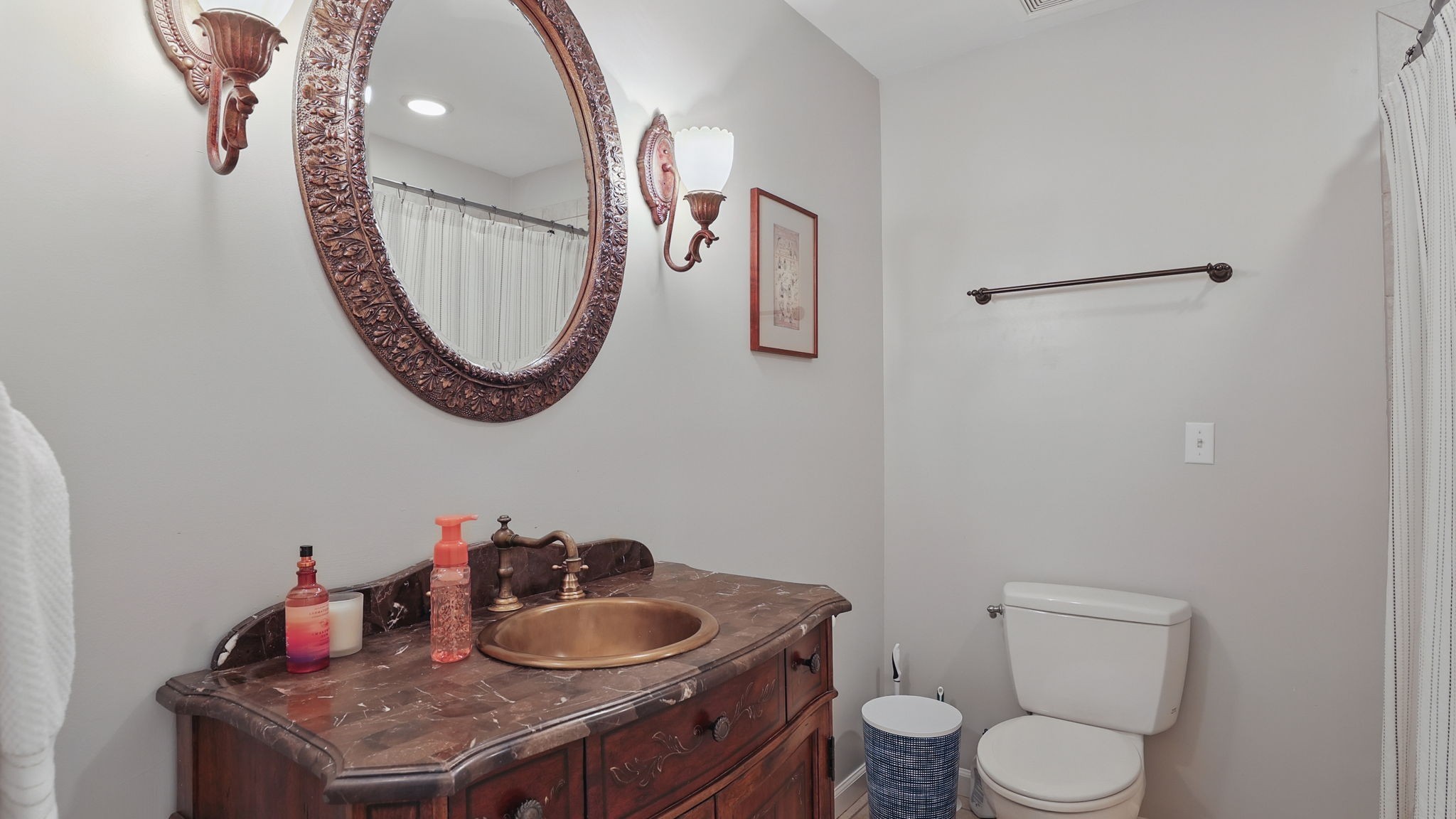 1719 Waterford Road Murfreesboro, TN 37129 - Photo 32 of 55 a bathroom with a toilet a sink and a mirror