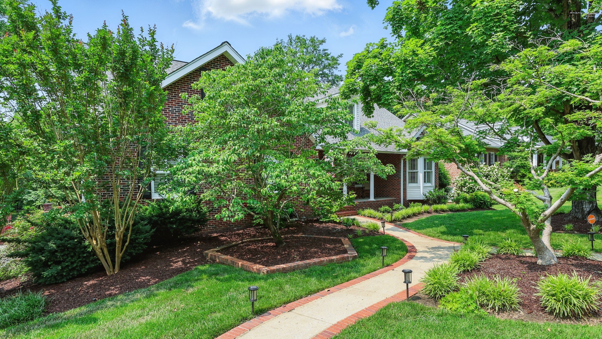 1719 Waterford Road Murfreesboro, TN 37129 - Photo 4 of 55 a view of a backyard with potted plants and large trees