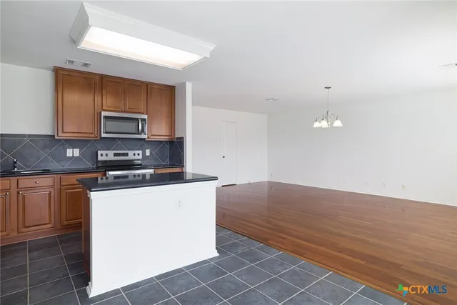 a view of a room with windows