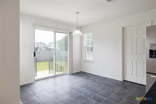 a view of a room with windows