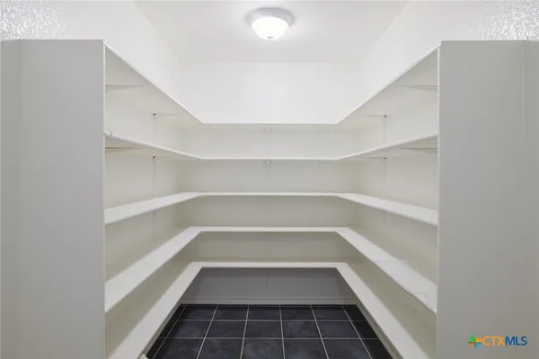 a view of a room with shelves