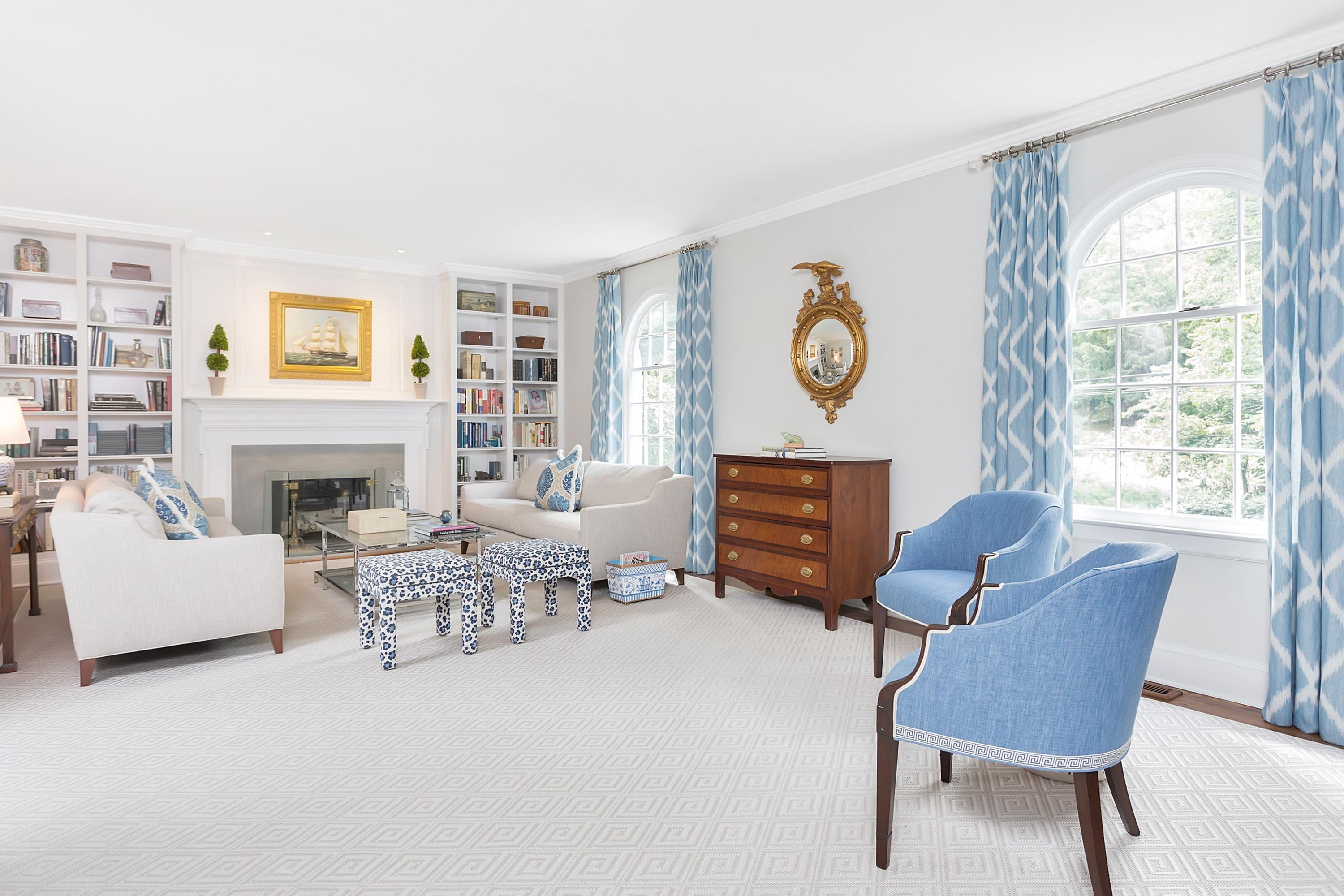 73 Locust Hill Road Darien, CT 06820 - Photo 3 of 34 a living room with furniture and a fireplace