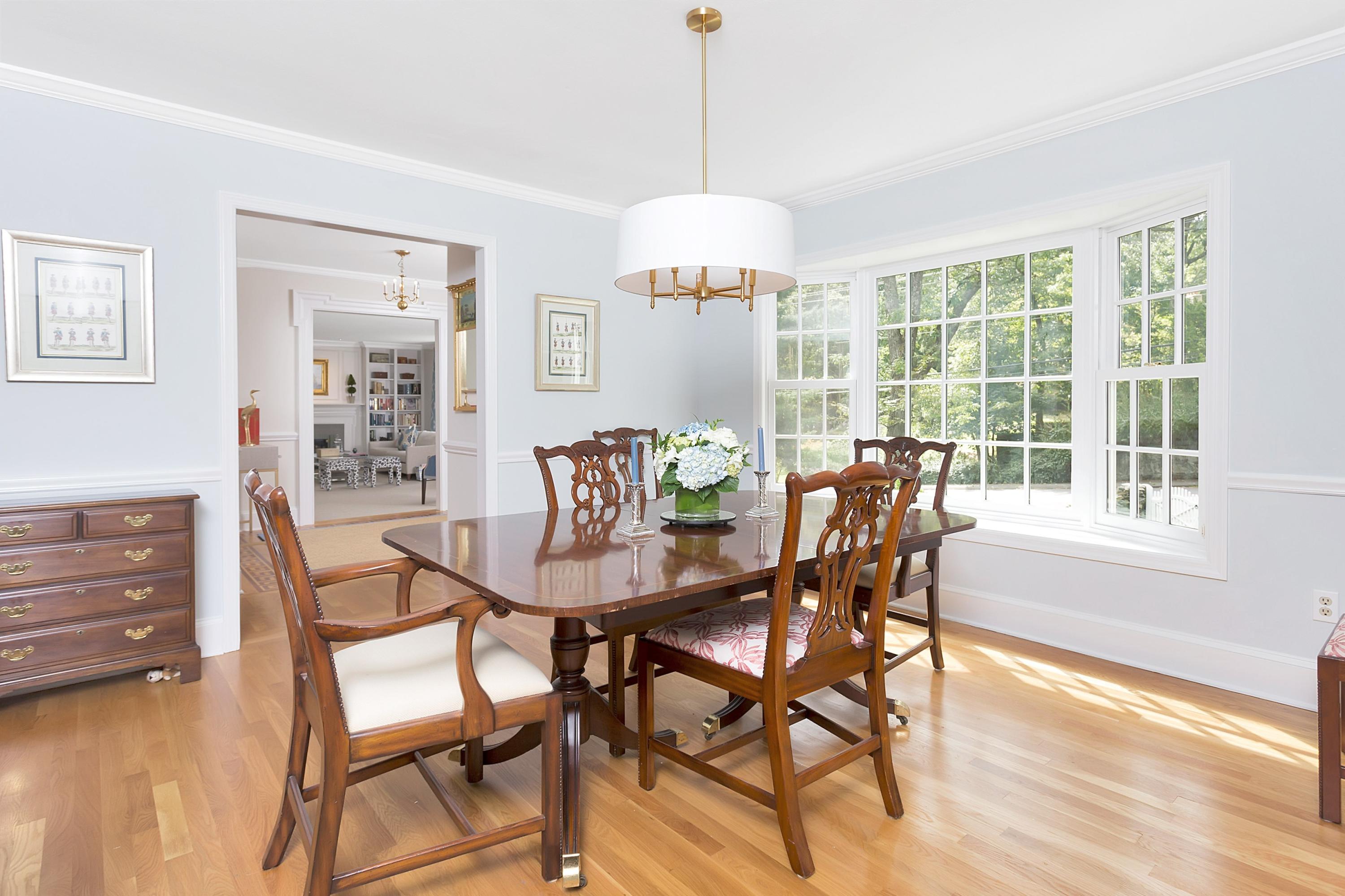 73 Locust Hill Road Darien, CT 06820 - Photo 6 of 34 a view of a dining room with furniture window and wooden floor