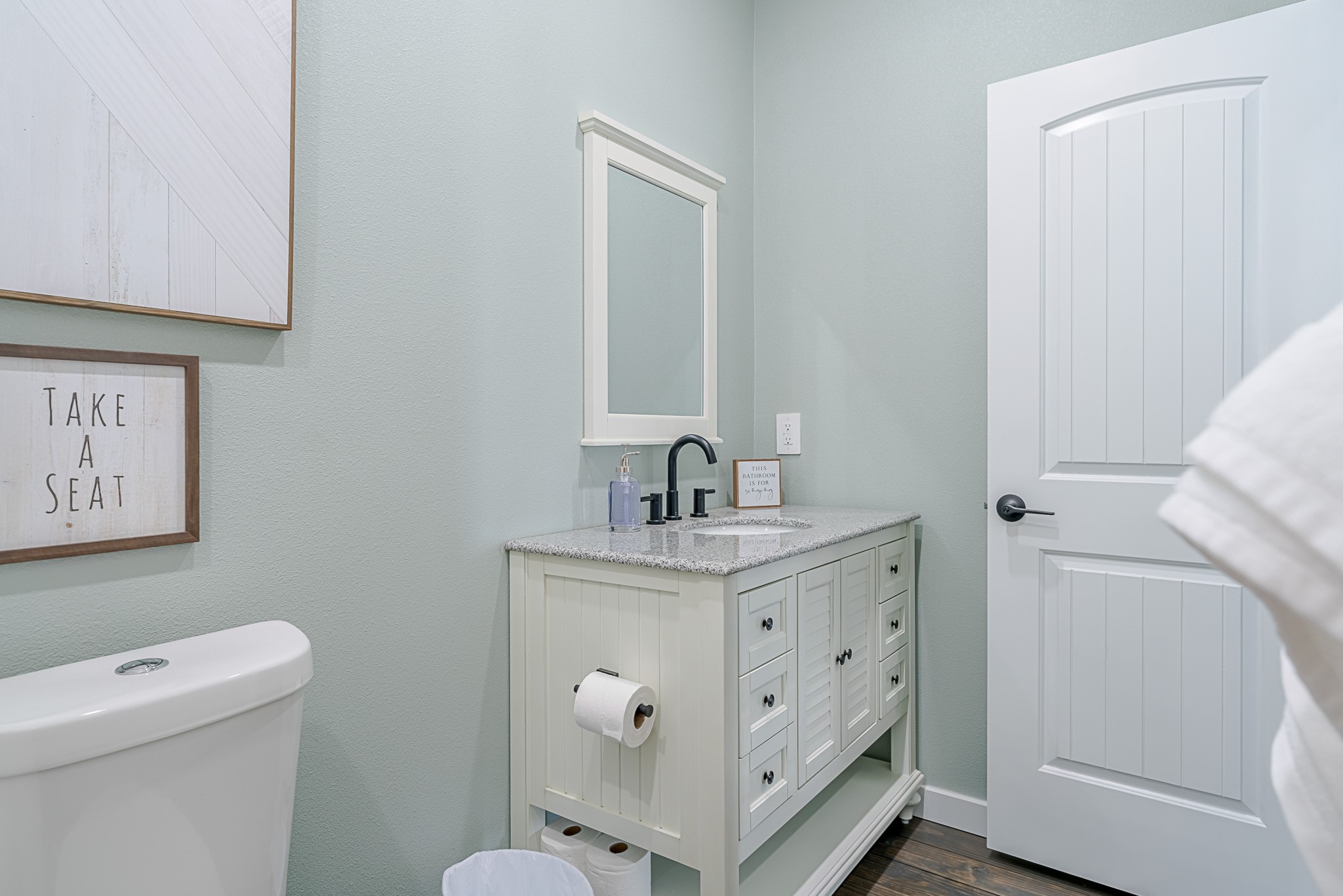1057 Johnson Road Port Bolivar, TX 77650 - Photo 19 of 40 Getting ready is easy in your bright bathroom, with a roomy vanity, plenty of storage, and a clean coastal feel.