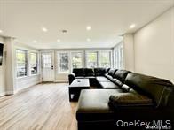 275 Sound Road Greenport, NY 11944 - Photo 20 of 28 Living area featuring recessed lighting and light wood finished floors