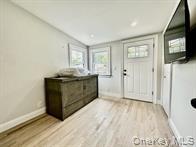 275 Sound Road Greenport, NY 11944 - Photo 24 of 28 Entrance foyer featuring light wood-style flooring and recessed lighting