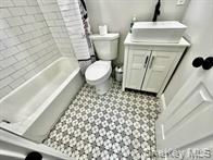 275 Sound Road Greenport, NY 11944 - Photo 26 of 28 Full bathroom with vanity and shower / bath combo