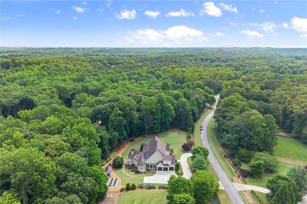 322 Edwards Brook Lane Canton, GA 30115 - Photo 96 of 99 an aerial view of a house with a yard