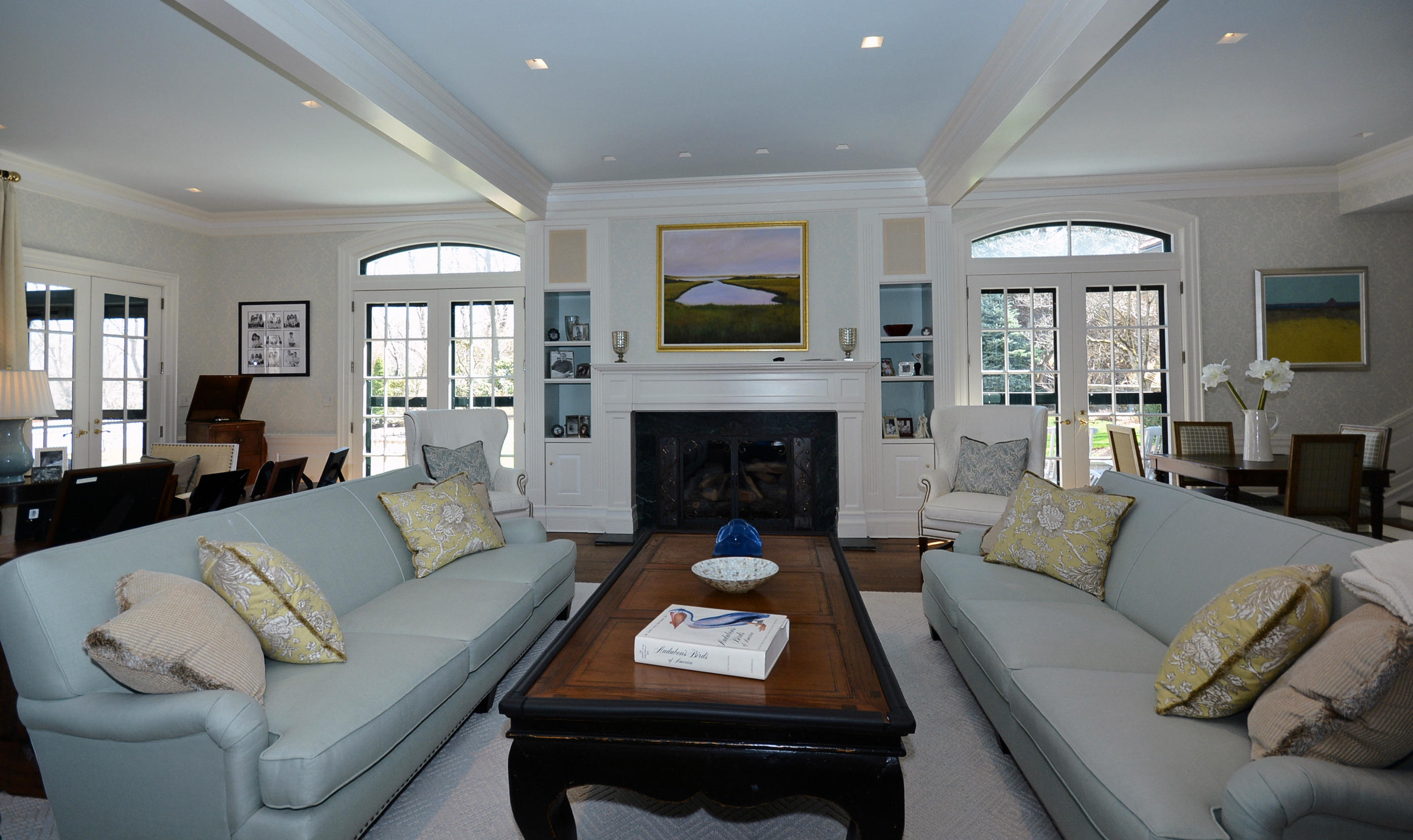 85 Rosebrook Road New Canaan, CT 06840 - Photo 4 of 27 a living room with furniture and a fireplace