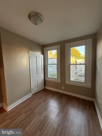 a bathroom with a toilet and a sink