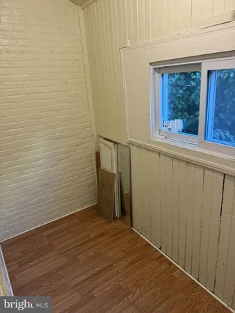 a kitchen with a stove and a refrigerator