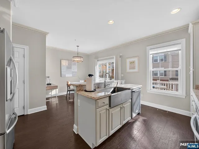 a view of living room with furniture and windows