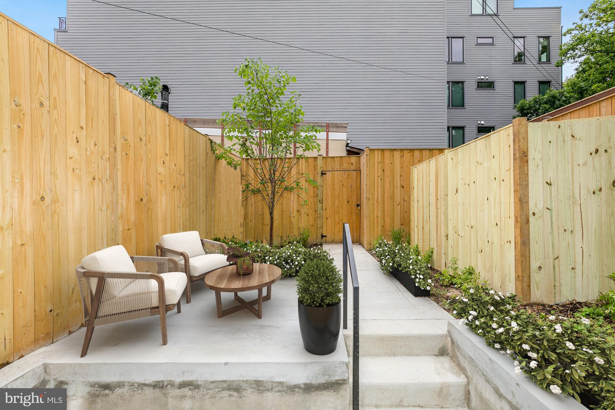 a outdoor space with patio furniture and plants