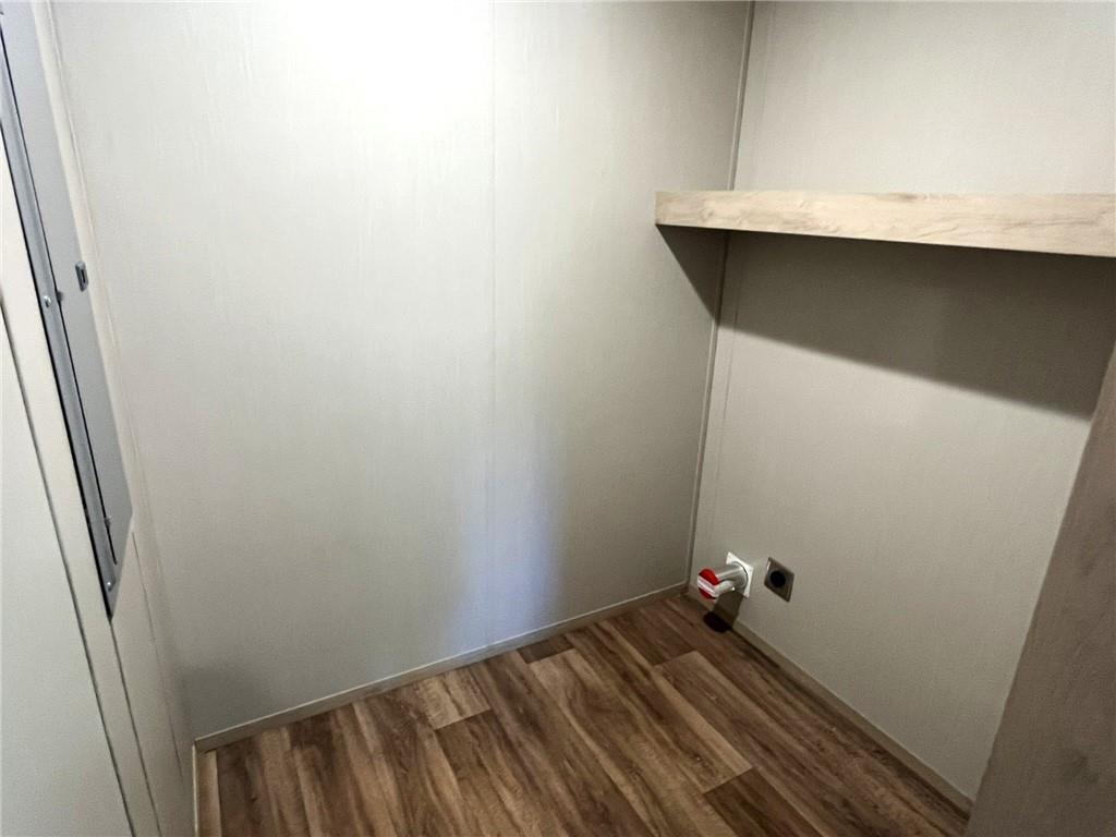 2860 Camp Road Jasper, GA 30143 - Photo 16 of 19 a room with a wooden floor and small window