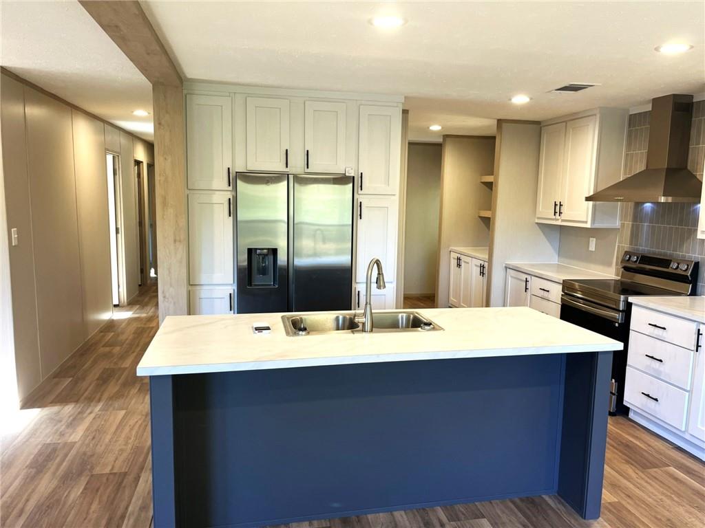 2860 Camp Road Jasper, GA 30143 - Photo 6 of 19 a large kitchen with a table and chairs