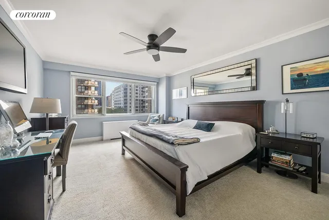 a bed room with a bed and a desk